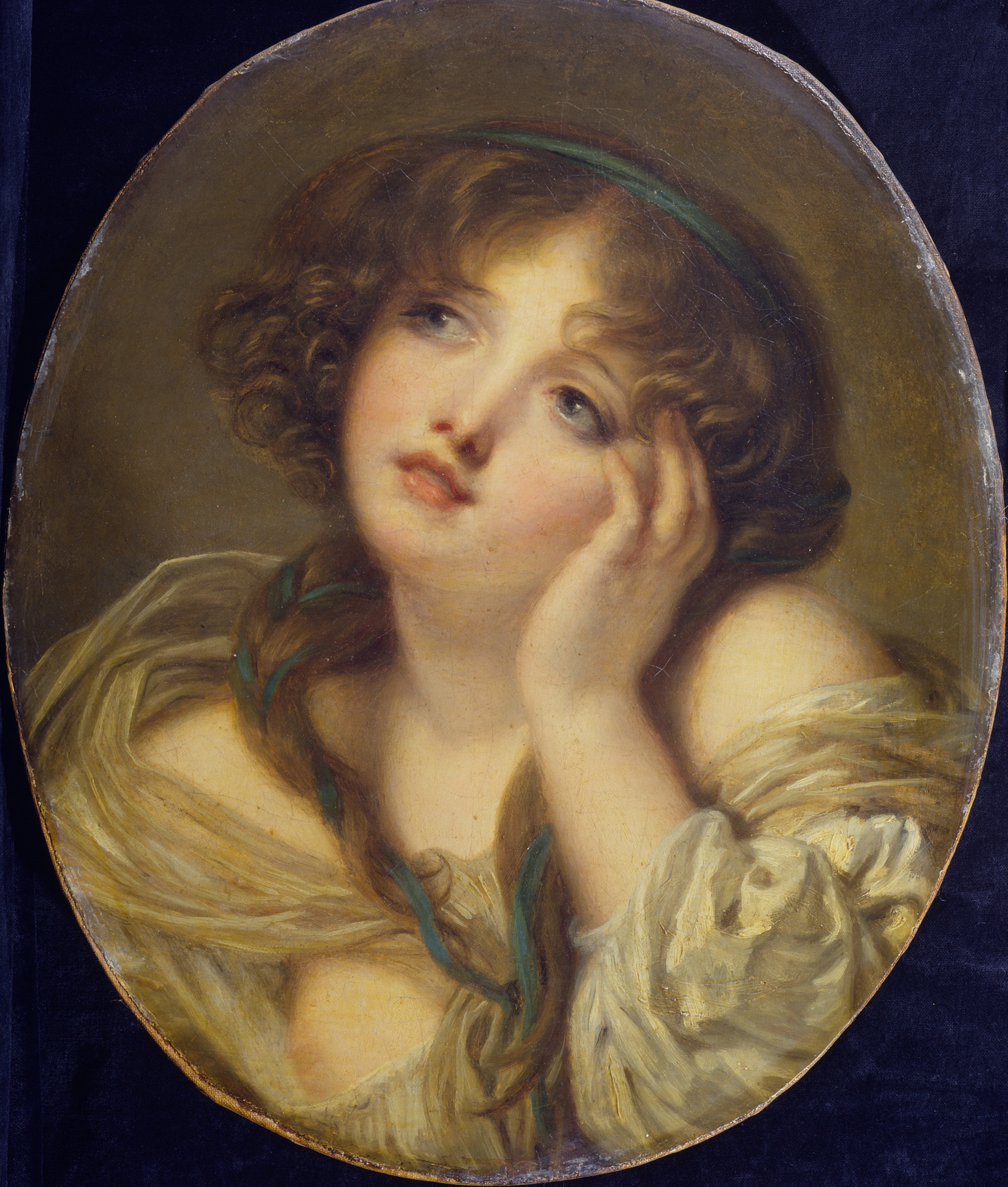 Young Woman leaning on her Hand